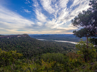The beautiful sky with river separator between forest.