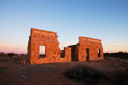 facade of old ruin in morning light