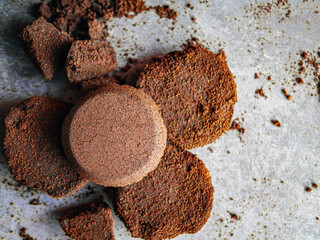 Top view of coffee grounds from espresso machine. coffee ground on gray background