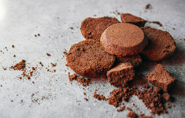 Close-up of coffee grounds from espresso machine. coffee ground on gray background