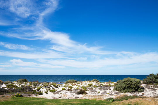 blue sky over calm water and white sand - Powered by Adobe