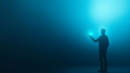 Fototapeta premium Man holding light in the dark symbol of hope and illumination