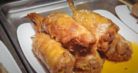 Chengdu, Sichuan, China. Fried Chicken Wings With Sauce. Chicken Wings, Hot Wings, Or Just Wings Is Popular Street Snack. Chinese Street Food. Street Barbecue. Asian Food. Asian Cuisine