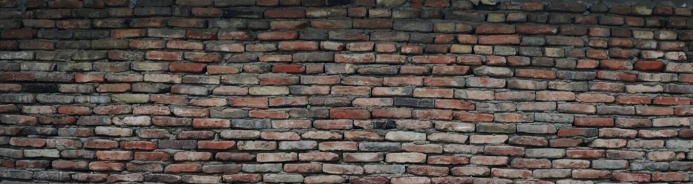Old weathered brick wall texture background, rustic damaged masonry pattern