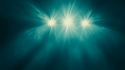 Bright lights shining above a dark teal illuminated space