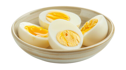 Boiled eggs halved and showing yolk in a bowl on transparent background