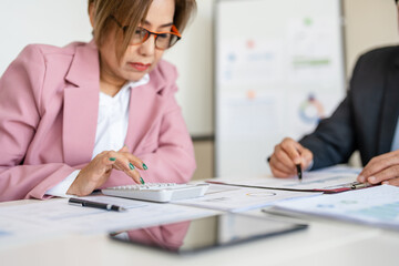 Business audits using a calculator financial data investment fund . Tax Compliance And Invoice Accounting In Office. Business Accountant People Doing Tax Audit And Accounting Using Calculator