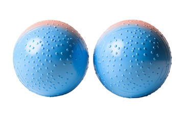 Two textured blue balls positioned closely together on a white background, ideal for use in fitness, play, or decorative purposes.