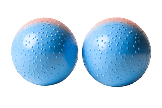 Two textured blue balls positioned closely together on a white background, ideal for use in fitness, play, or decorative purposes.