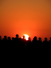 Fototapeta premium Silhouette of a platoon of army soldiers at sunset