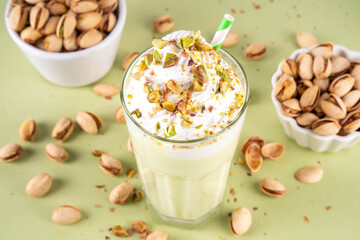Pistachio milkshake, healthy diet protein cocktail, non-dairy whipped shake with vegan pistachio...