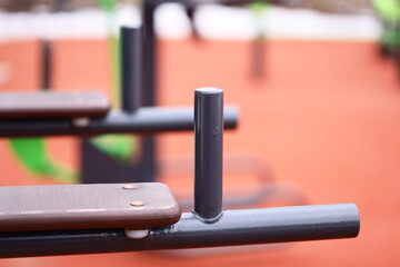 A close-up shot of a bench on a tennis court, perfect for sports or fitness-related content.
