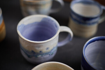 Ceramic cup on rustic background