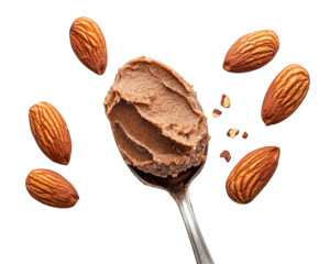 Creamy almond paste on spoon surrounded by whole almonds, showcasing its rich texture and natural ingredients. Perfect for baking or spreading