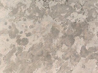 Abstract Grunge Decorative Rough Uneven Stucco Wall Background Art texture.Raw And Weathered Concrete Texture In Soft Gray With Subtle Layered Patterns For A minimalist And Urban Aesthetic Texture.