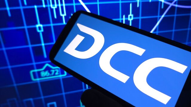 Konskie, Poland - March 07, 2025: DCC plc company logo displayed on mobile phone
