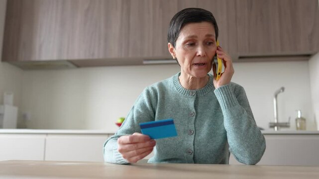 Scared nervous woman transferring money to scammers over phone. Fraud deception, bank card information theft, manipulation identity theft, financial crime, personal data exposure, vulnerable scam