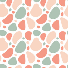 Seamless pattern with abstract spots in pastel orange and green tones. Vector illustration