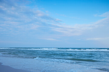 The peaceful beach sea with cloudy sky in Thailand
