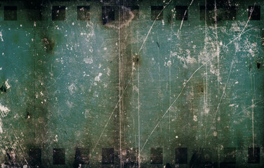 35 mm photographic film with perforated, scratched, smudged and dirty surface.