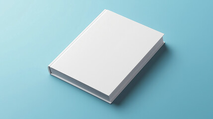 Fototapeta premium Minimalist Blank Book Mockup on a Clean Blue Background