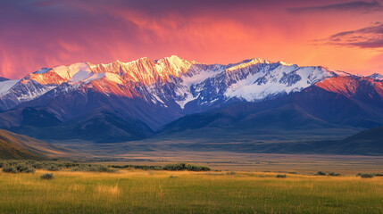 Fototapeta premium Stunning Panoramic View of Snow Capped Mountains at Sunrise