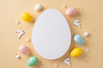 Easter-themed composition featuring a blank white egg surrounded by colorful decorations, bunnies,...