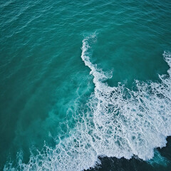 Fototapeta premium Aerial view beautiful of sea waves from drone. Stock image of blue color of ocean water, sea surface. Top view on turquoise waves, clear water surface texture.