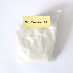 NaBr sodium bromide CAS 7647-15-6 chemical substance in white plastic laboratory packaging