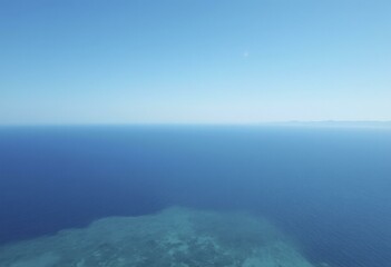 Vast Ocean Landscape Under Clear Blue Sky
