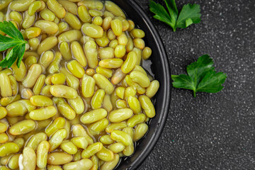 Beans flageolet green bean fresh gourmet food background on the table rustic food top view copy space vegetarian and vegan food