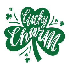 Green lucky charm shamrock with hand-lettered text. St. Patrick’s Day festive design with clover leaves and decorative elements on a white background.