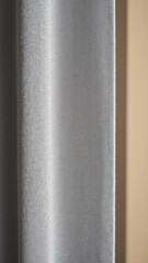 Fototapeta premium A close-up photo of a textured wall panel with visible seams.