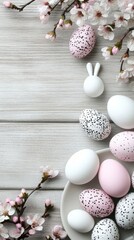 Obraz premium Naturally dyed Easter eggs in pastel colors are artistically displayed on a plate with a linen napkin alongside spring flowers