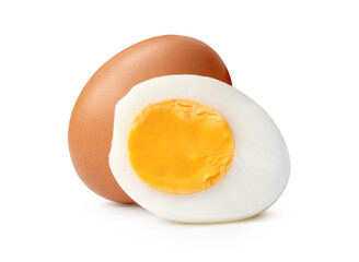 Front view of raw brown chicken eggs and cooked or boiled chicken egg with egg yolk in half in stack isolated on white background with clipping path