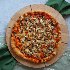 Top view of pizza with mushrooms, cheese, copy space, moc up