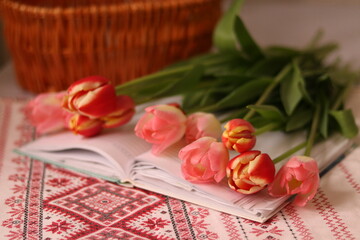 red tulips and a cup of tea