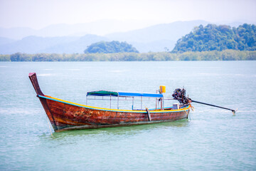 Fishing boat with colorful color on the sea water . Vintage travel style. Ranong Sea of Thailand.