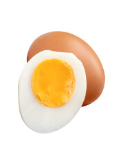 Front view of raw brown chicken eggs and cooked or boiled chicken egg with egg yolk in half in stack isolated with clipping path in png file format