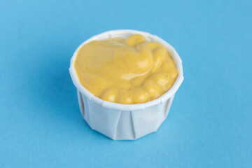 Sauce in paper container