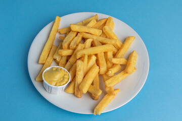 A Plate of Fries and Sauce
