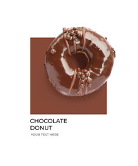 Creative layout made of chocolate donut on the brown and white background. Flat lay. Food concept. Lemon on white background.