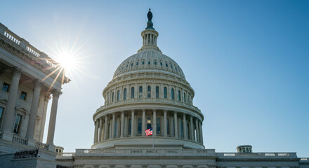 Obraz premium US Capitol Building: Majestic Dome, American Flag, Bright Sun. Washington DC Architecture, Government Landmark, Travel Photography.
