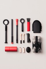 neatly arranged set of firefighter tools on plain unadorned background