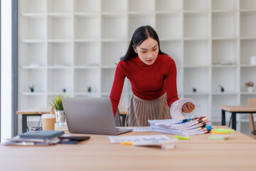 Auditor business woman Business Documents checking searching document legal prepare paperwork or...