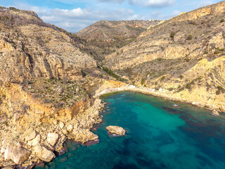 Aerial view of dramatic coastal cliffs along the Mediterranean Sea