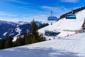 An adventurous skier carves through fresh powder on the pristine slopes of the Austria, Alps,...
