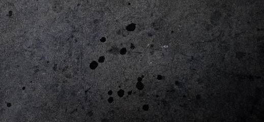Dark Grunge Concrete with Oil Stains Texture