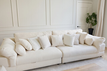 White couch with pillows