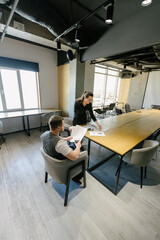 Office workers planning their job